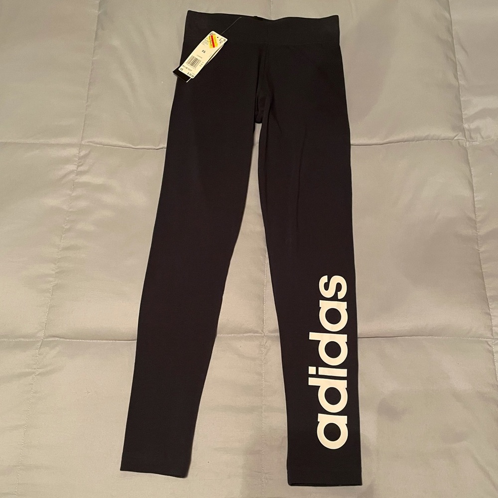 NWT. Adidas. Lightweight navy blue leggings.